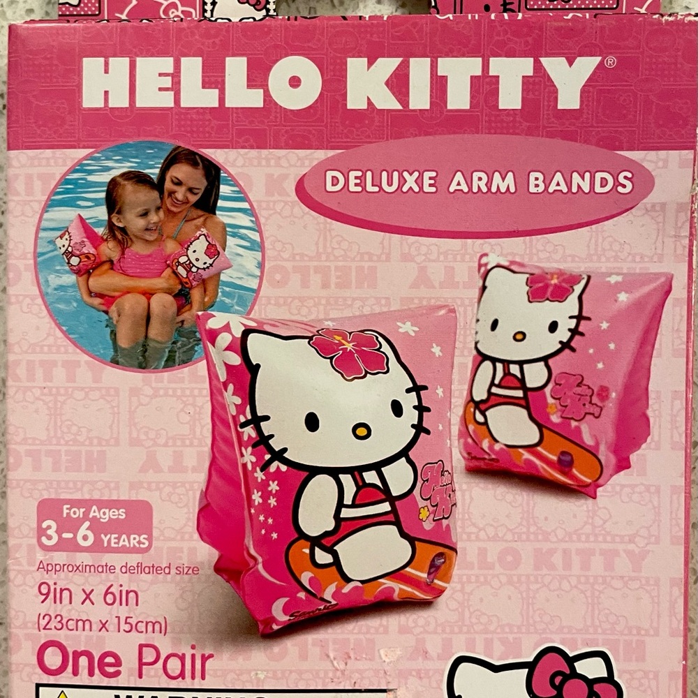 New in box, deluxe arm bands, 2 air chambers each, flat inner panel for comfort